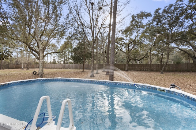 view of pool featuring fence and a fenced in pool