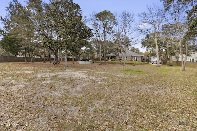 view of yard featuring fence