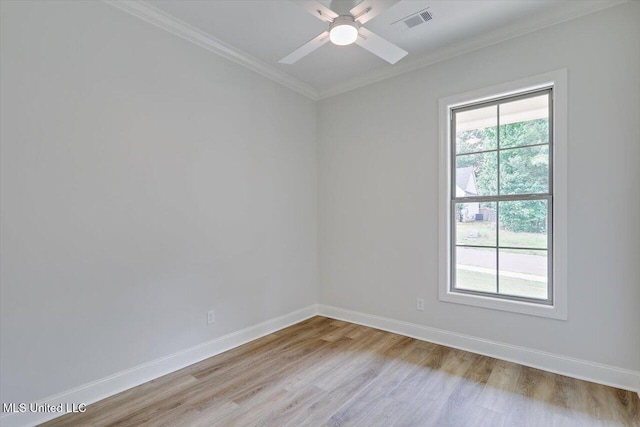 104 Brents Xing, Clinton, MS 39056 - empty room featuring ornamental molding, light wood-style floors, baseboards, and a ceiling fan