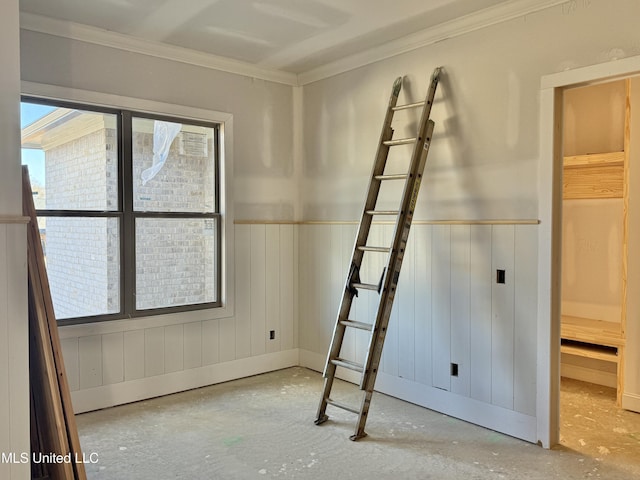 unfurnished room featuring ornamental molding