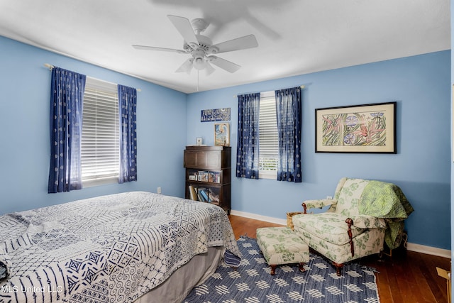 bedroom featuring hardwood / wood-style flooring and ceiling fan