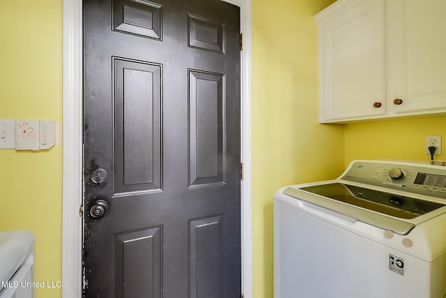 13061 Jordan Pl, Gulfport, MS 39503 - laundry room featuring cabinet space and washing machine and dryer