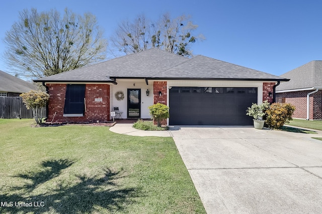 13061 Jordan Pl, Gulfport, MS 39503 - single story home with an attached garage, driveway, a shingled roof, and brick siding