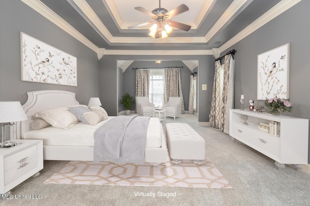 8679 Saddle Creek Dr, Olive Branch, MS 38654 - bedroom with a tray ceiling, carpet flooring, ornamental molding, and ceiling fan