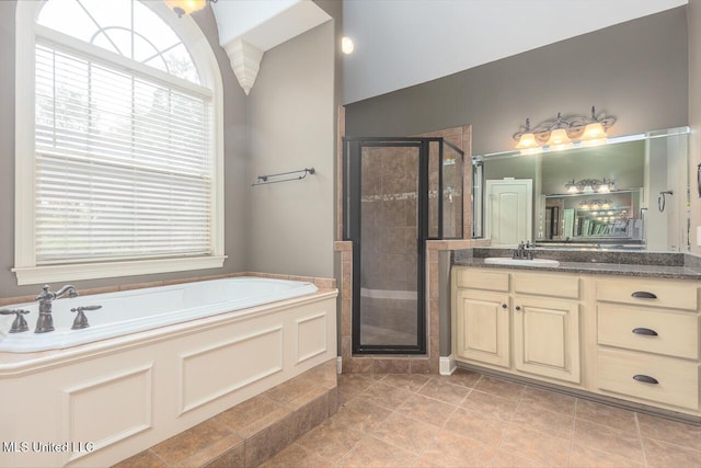 8679 Saddle Creek Dr, Olive Branch, MS 38654 - full bathroom featuring a stall shower, a bath, vanity, and tile patterned flooring