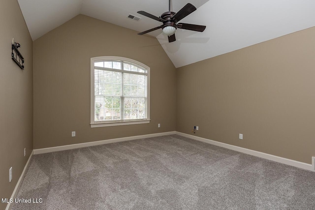8679 Saddle Creek Dr, Olive Branch, MS 38654 - spare room featuring a ceiling fan, carpet floors, and lofted ceiling