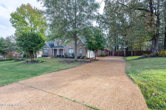 8679 Saddle Creek Dr, Olive Branch, MS 38654 - view of front of home with driveway and brick siding
