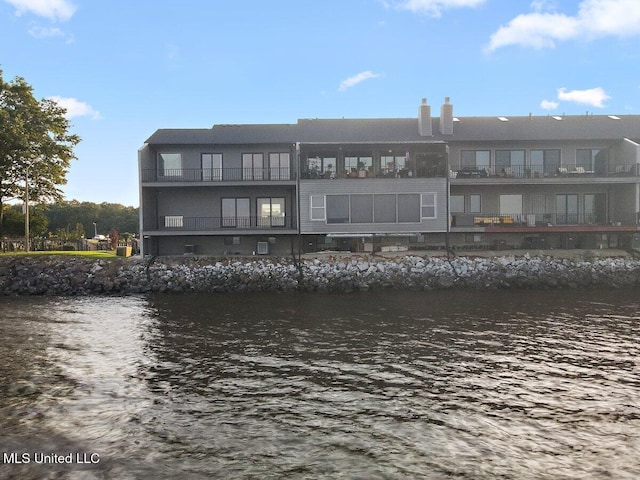 21 Breakers Ln, Ridgeland, MS 39157 - rear view of property with a water view and a chimney