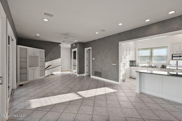 21 Breakers Ln, Ridgeland, MS 39157 - kitchen featuring recessed lighting, white cabinetry, a ceiling fan, a sink, and light tile patterned flooring