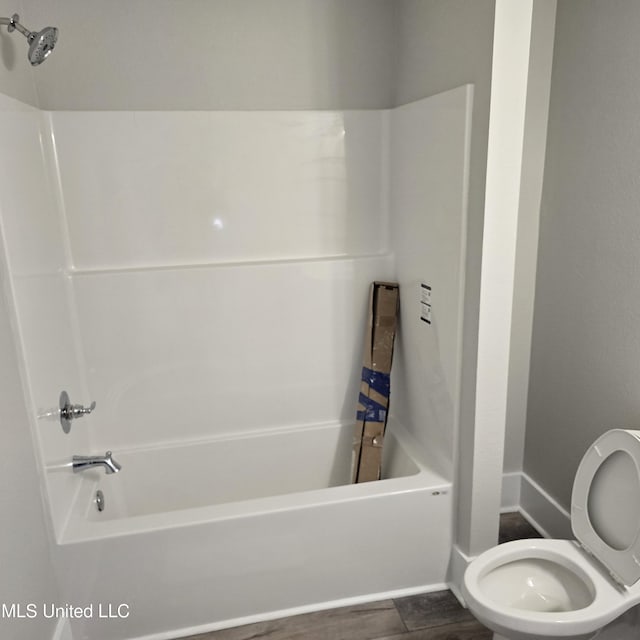 246 Bohn St, Biloxi, MS 39530 - bathroom featuring tub / shower combination and wood finished floors