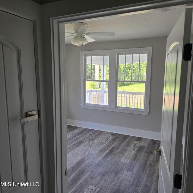 246 Bohn St, Biloxi, MS 39530 - empty room featuring ceiling fan and dark wood-style floors