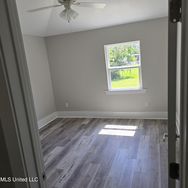 246 Bohn St, Biloxi, MS 39530 - empty room featuring a ceiling fan and wood finished floors