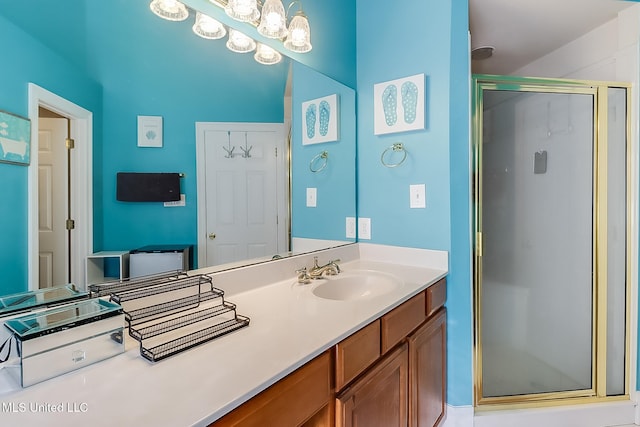 full bath featuring a shower stall and vanity