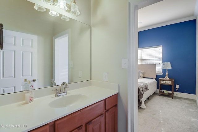 bathroom featuring vanity and baseboards