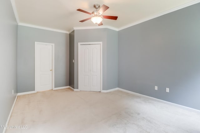 16383 Clearwater Cir, Gulfport, MS 39503 - unfurnished bedroom with crown molding, light carpet, a closet, and ceiling fan