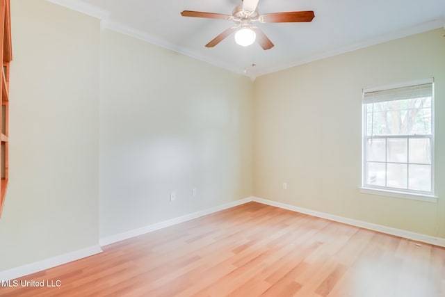 16383 Clearwater Cir, Gulfport, MS 39503 - empty room featuring light wood-style floors, ornamental molding, and ceiling fan