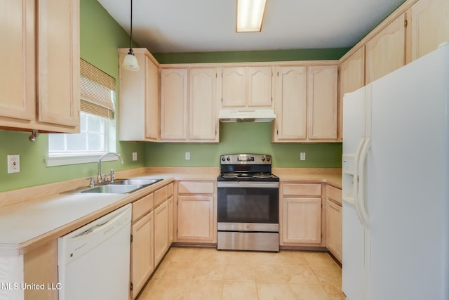 16383 Clearwater Cir, Gulfport, MS 39503 - kitchen featuring white appliances, under cabinet range hood, light brown cabinetry, light countertops, and light tile patterned floors