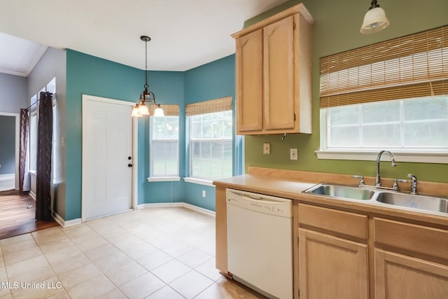 16383 Clearwater Cir, Gulfport, MS 39503 - kitchen with dishwasher, light brown cabinetry, decorative light fixtures, and ornamental molding