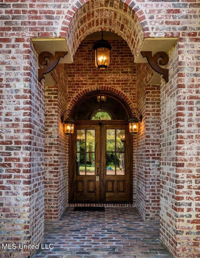 property entrance featuring french doors