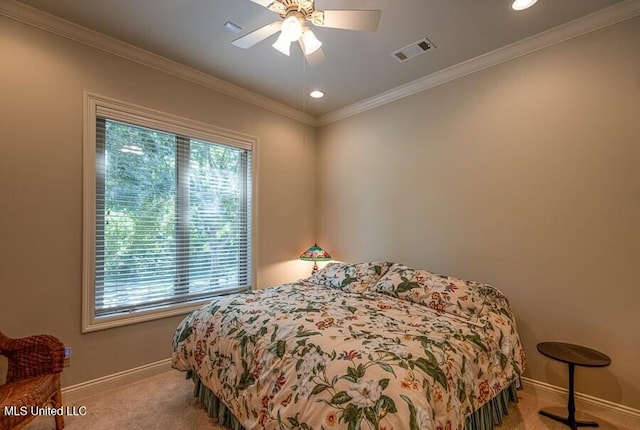 bedroom featuring ceiling fan, ornamental molding, and light carpet