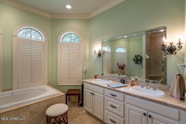 bathroom featuring independent shower and bath, vanity, tile patterned floors, and ornamental molding