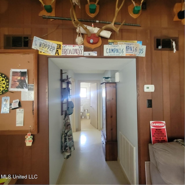 hall featuring visible vents