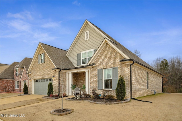 view of front of property featuring a garage