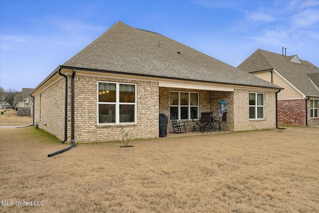 back of property featuring a patio