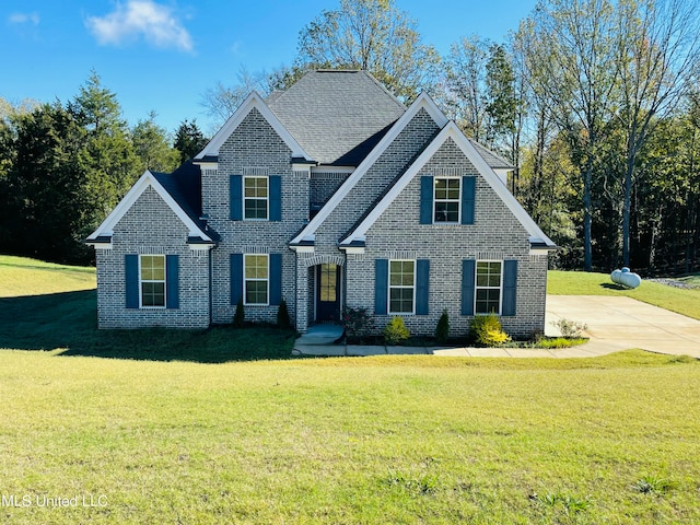 view of front of house with a front lawn