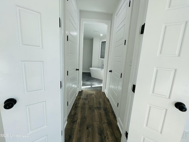 188 E Byhalia Creek Farms Rd, Byhalia, MS 38611 - hallway featuring dark wood-type flooring and baseboards