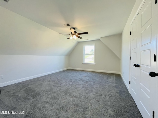 188 E Byhalia Creek Farms Rd, Byhalia, MS 38611 - additional living space featuring ceiling fan, dark colored carpet, baseboards, and lofted ceiling