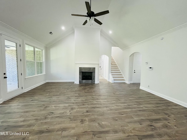 188 E Byhalia Creek Farms Rd, Byhalia, MS 38611 - unfurnished living room featuring ceiling fan, arched walkways, baseboards, lofted ceiling, and ornamental molding