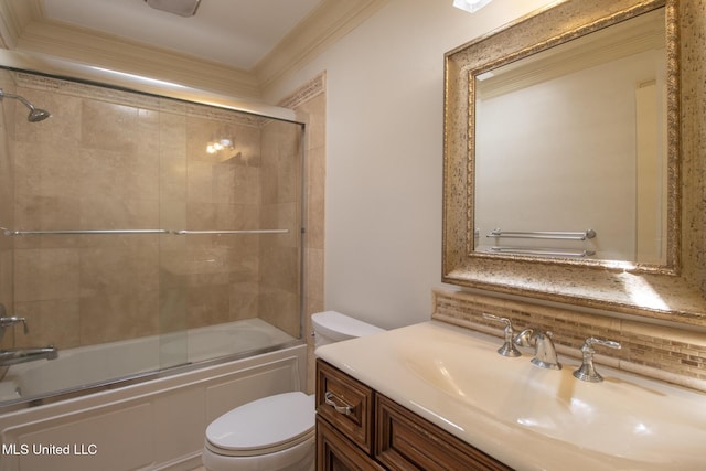 5100 Monroe Ave, Gulfport, MS 39507 - bathroom with toilet, backsplash, crown molding, combined bath / shower with glass door, and vanity
