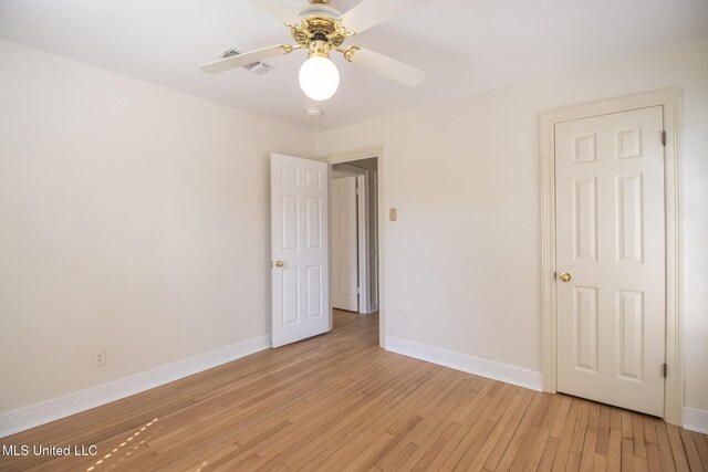 5100 Monroe Ave, Gulfport, MS 39507 - unfurnished bedroom featuring light wood-style floors, visible vents, baseboards, and ceiling fan