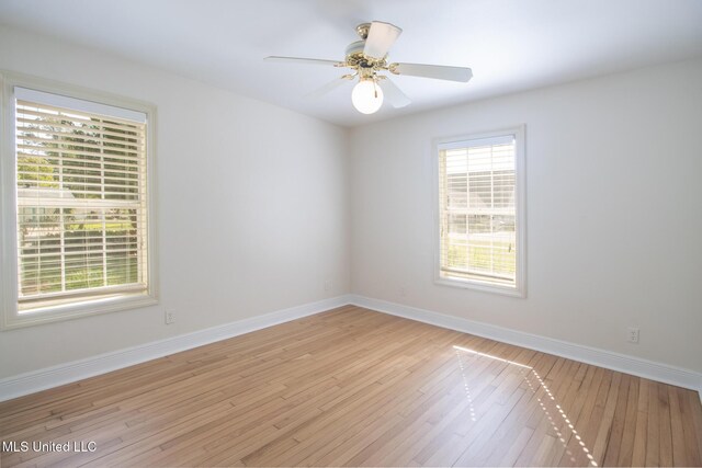 5100 Monroe Ave, Gulfport, MS 39507 - unfurnished room featuring light wood-type flooring, a ceiling fan, and baseboards