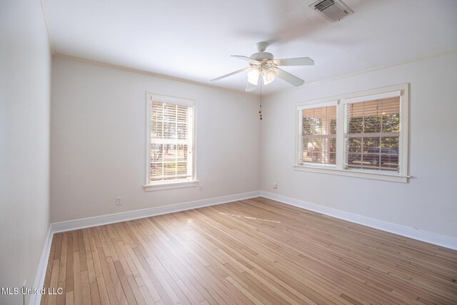 5100 Monroe Ave, Gulfport, MS 39507 - unfurnished room with plenty of natural light, visible vents, a ceiling fan, and ornamental molding