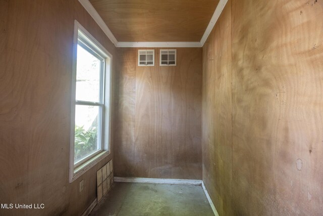5100 Monroe Ave, Gulfport, MS 39507 - empty room with plenty of natural light, visible vents, unfinished concrete flooring, and ornamental molding