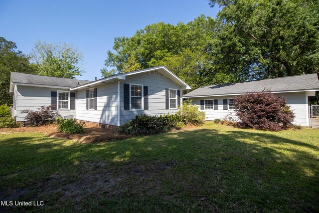 5100 Monroe Ave, Gulfport, MS 39507 - view of side of home with a yard