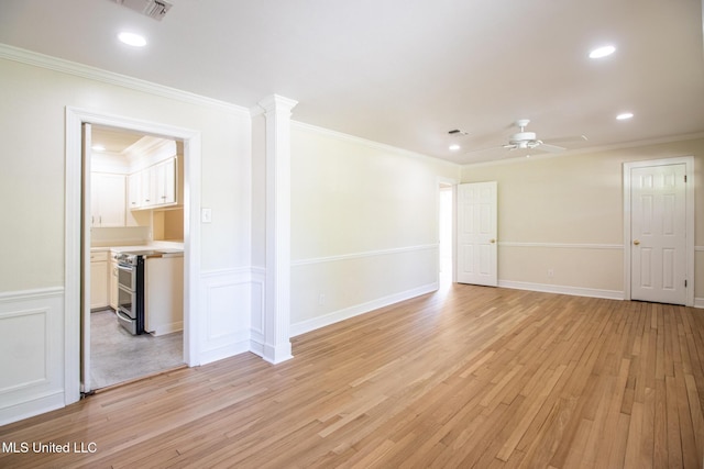 5100 Monroe Ave, Gulfport, MS 39507 - spare room featuring light wood-type flooring, visible vents, crown molding, and ceiling fan