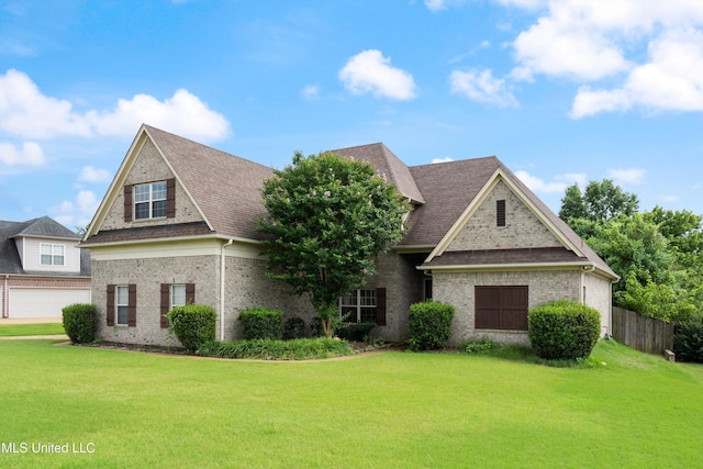 12857 Arbor Dr, Olive Branch, MS 38654 - view of front of home with brick siding and roof with shingles