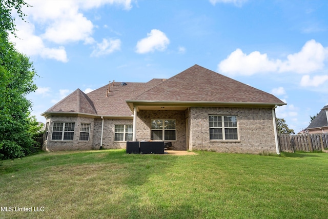 12857 Arbor Dr, Olive Branch, MS 38654 - back of property with a shingled roof and brick siding