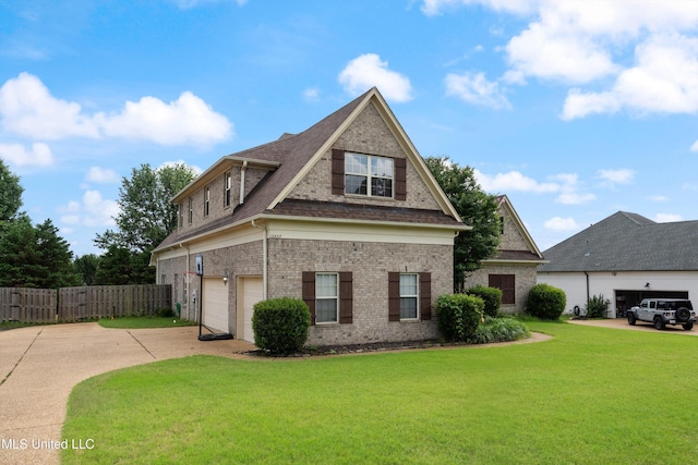12857 Arbor Dr, Olive Branch, MS 38654 - view of front of house featuring driveway, brick siding, and a garage