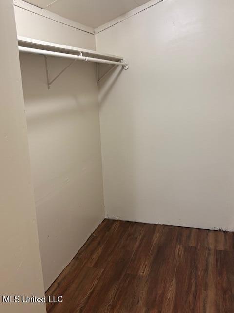 1108 W President Ave, Greenwood, MS 38930 - spacious closet with dark wood-style flooring