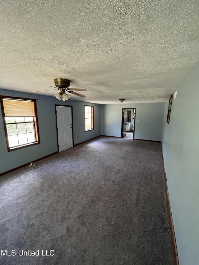 5020 Barrier Pl, Jackson, MS 39204 - spare room featuring ceiling fan, carpet, and baseboards