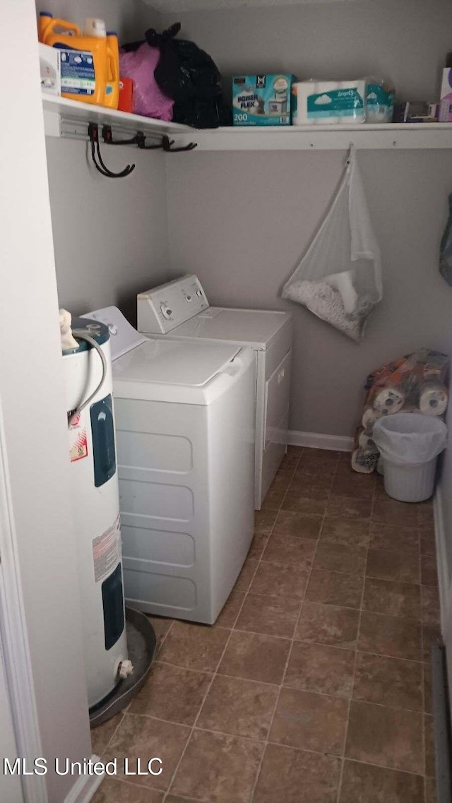 laundry area featuring washer and dryer and electric water heater