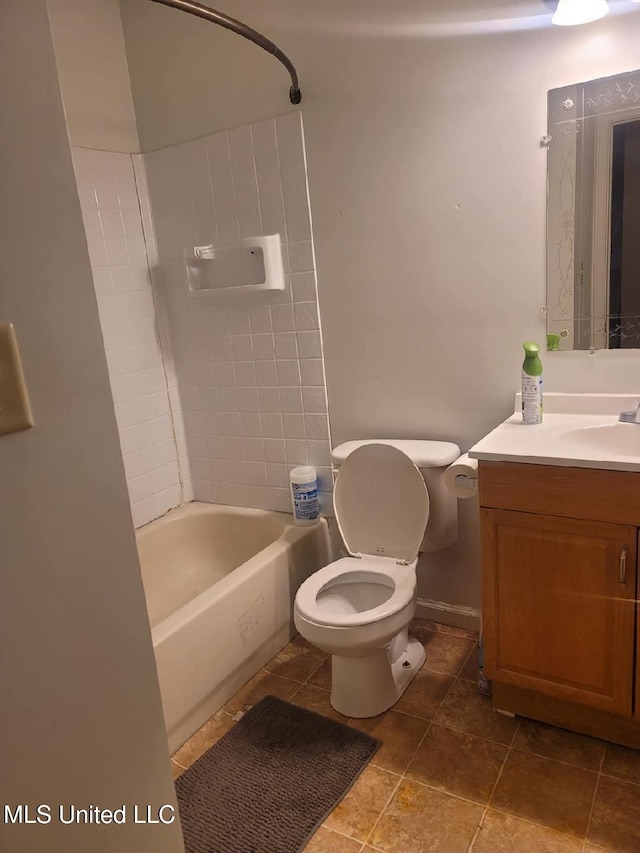 full bathroom featuring tub / shower combination, toilet, and vanity