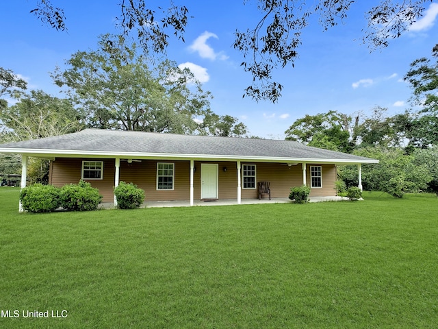 ranch-style home featuring a porch and a front lawn