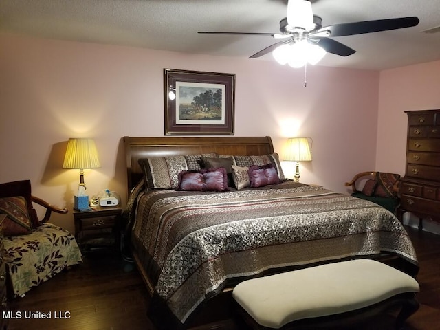 13456 John Clark Rd, Gulfport, MS 39503 - bedroom with wood finished floors and a ceiling fan