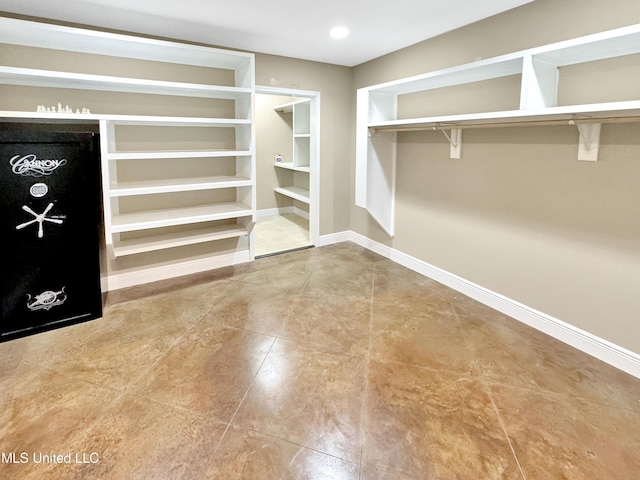 13456 John Clark Rd, Gulfport, MS 39503 - spacious closet featuring tile patterned floors