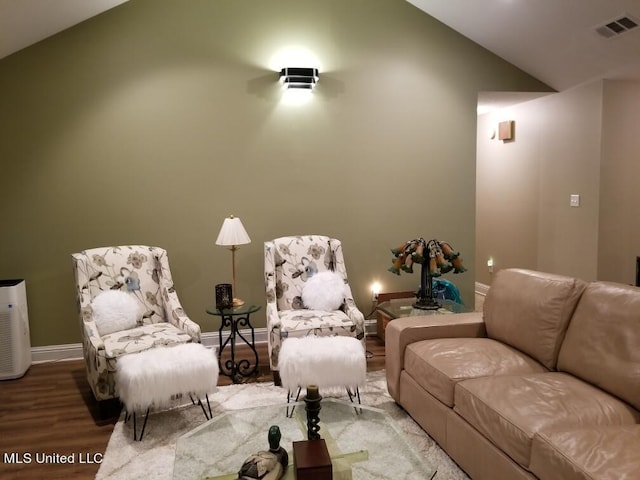 13456 John Clark Rd, Gulfport, MS 39503 - living room with wood finished floors, baseboards, and high vaulted ceiling